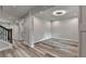 Open-concept living room featuring hardwood floors, recessed lighting, and neutral paint at 194 Jennifer Nw Ln, Lilburn, GA 30047