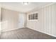 Cozy bedroom with neutral carpet and trim at 2044 Glendale Dr, Decatur, GA 30032