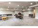 Finished basement offers entertainment space for the whole Gathering with room for a game table and seating at 2855 Drayton Hall Dr, Buford, GA 30519