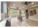 Basement kitchenette with stainless steel appliances, granite counters, and a view of the backyard at 2855 Drayton Hall Dr, Buford, GA 30519