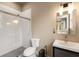 Modern bathroom featuring sleek vanity, a toilet, and a glass-enclosed shower with white subway tile surround at 2855 Drayton Hall Dr, Buford, GA 30519