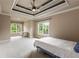 Large bedroom with tray ceilings, many windows and natural light at 2855 Drayton Hall Dr, Buford, GA 30519