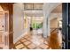 Grand foyer with hardwood floors, soaring ceilings, and elegant staircase welcomes you into the home at 2855 Drayton Hall Dr, Buford, GA 30519