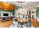 Open concept living space with a kitchen, dining area, and stylish furnishings at 2855 Drayton Hall Dr, Buford, GA 30519