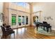 Grand living room with high ceilings, hardwood floors, and a beautiful view of the outdoors at 2855 Drayton Hall Dr, Buford, GA 30519