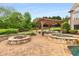 Outdoor living area featuring a pergola-covered seating area, fire pit, and hot tub at 2855 Drayton Hall Dr, Buford, GA 30519