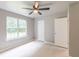 Inviting bedroom with a window and ceiling fan, offering a comfortable retreat at 3022 Stonebridge Creek Dr, Lithonia, GA 30058