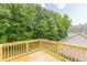 Spacious wooden deck, overlooking a lush green backyard at 3022 Stonebridge Creek Dr, Lithonia, GA 30058