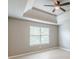 The main bedroom boasts a trey ceiling and luxury vinyl plank flooring at 3022 Stonebridge Creek Dr, Lithonia, GA 30058