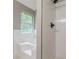 Bright bathroom featuring a separate shower, subway tiled accent wall and soaking tub with bronze fixtures at 3022 Stonebridge Creek Dr, Lithonia, GA 30058
