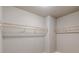 A walk-in closet providing ample storage with built in shelving and hanging space at 3022 Stonebridge Creek Dr, Lithonia, GA 30058