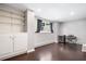 Basement with window, recessed lights, hardwood floors and built-ins at 47 Centerport Dr, White, GA 30184
