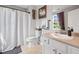 Bathroom with shower/tub combo and neutral color palette at 47 Centerport Dr, White, GA 30184