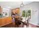 Cozy dining area with hardwood floors and natural light, adjacent to the kitchen at 47 Centerport Dr, White, GA 30184