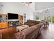 Open-concept living room with hardwood floors, high ceilings, and abundant natural light at 47 Centerport Dr, White, GA 30184