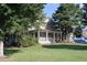 Charming home featuring a front porch, two-car garage, and well-manicured lawn at 1699 Little Fox Ln, Dacula, GA 30019