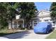 Charming home featuring a front porch, two-car garage, and well-manicured lawn at 1699 Little Fox Ln, Dacula, GA 30019