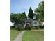 Charming two-story home with a brick stairway, landscaped front yard, and inviting front porch at 1699 Little Fox Ln, Dacula, GA 30019