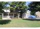 Charming home featuring a front porch, two-car garage, and well-manicured lawn at 1699 Little Fox Ln, Dacula, GA 30019
