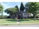 Charming two-story home with a brick stairway, landscaped front yard, and inviting front porch at 1699 Little Fox Ln, Dacula, GA 30019