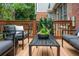 Relaxing back deck showcasing stylish outdoor furniture and serene backyard views at 190 Centennial Way, Atlanta, GA 30313