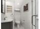 This bathroom features tile walls, toilet, sink, cabinet, and shower at 190 Centennial Way, Atlanta, GA 30313