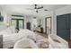 Bedroom with a ceiling fan, wood floors, and ensuite bathroom access at 190 Centennial Way, Atlanta, GA 30313