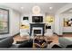 Inviting living room featuring a fireplace, plush seating, and contemporary artwork at 190 Centennial Way, Atlanta, GA 30313