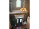 Grand foyer featuring hardwood floors, a chandelier, and double doors with decorative windows at 209 Kingscastle Dr, Ellenwood, GA 30294