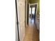 Hallway with tiled floors and doorways leading to other rooms at 209 Kingscastle Dr, Ellenwood, GA 30294