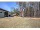 Home featuring a backyard with swingset and patio at 34 Mountainbrook Nw Dr, Cartersville, GA 30121
