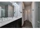 Modern bathroom with double sinks, sleek vanity, and tiled shower at 34 Mountainbrook Nw Dr, Cartersville, GA 30121