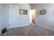 Bedroom features two doors, neutral carpeting, and gray walls at 34 Mountainbrook Nw Dr, Cartersville, GA 30121