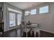 Cozy dining area with a vintage-style table, comfortable seating, and natural light creating an inviting atmosphere at 34 Mountainbrook Nw Dr, Cartersville, GA 30121