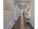 Hallway with hardwood floors, neutral paint, and natural light at 34 Mountainbrook Nw Dr, Cartersville, GA 30121