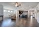 Open-concept living space connecting the living room, dining area, and kitchen to create a cohesive and inviting atmosphere at 34 Mountainbrook Nw Dr, Cartersville, GA 30121