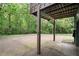 A view of the backyard showcasing the lush green lawn and shade trees at 855 Cedar Bluff Ct, Marietta, GA 30062