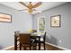 Comfortable dining area with hardwood floors, window views, a dark wood table and seating for four at 855 Cedar Bluff Ct, Marietta, GA 30062