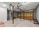 This garage has an open floor plan and a rear garage door to the backyard at 855 Cedar Bluff Ct, Marietta, GA 30062