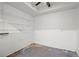 This storage space has white brick walls and wire shelving at 855 Cedar Bluff Ct, Marietta, GA 30062