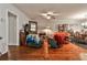 Spacious living room with hardwood floors, ceiling fan, and plenty of natural light at 1111 Clairemont Ave # 5, Decatur, GA 30030
