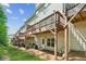 Backyard features an easy to maintain green space with multi-level wooden decks at 1327 Rosen Rd, Brookhaven, GA 30319