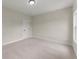 Simple bedroom featuring neutral carpet and walls at 1419 Coretta Bnd, Atlanta, GA 30318