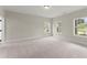 Spacious carpeted bedroom with lots of natural light at 1419 Coretta Bnd, Atlanta, GA 30318