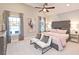 Comfortable bedroom with natural light and tufted headboard at 1419 Coretta Bnd, Atlanta, GA 30318
