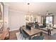 Spacious dining area connected to the living room and kitchen with stainless appliances at 1419 Coretta Bnd, Atlanta, GA 30318