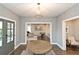 Elegant foyer featuring hardwood floors and a view into a comfortable living space at 1419 Coretta Bnd, Atlanta, GA 30318