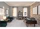 Well-lit home office with a brick accent wall and modern decor at 1419 Coretta Bnd, Atlanta, GA 30318