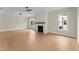 Spacious living room features a cozy fireplace and hardwood floors throughout at 1419 Coretta Bnd, Atlanta, GA 30318