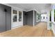 Charming porch features wood floors, gray vertical siding, and a stylish exterior at 1419 Coretta Bnd, Atlanta, GA 30318